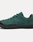 Dannto green barefoot trail shoes shown from the side