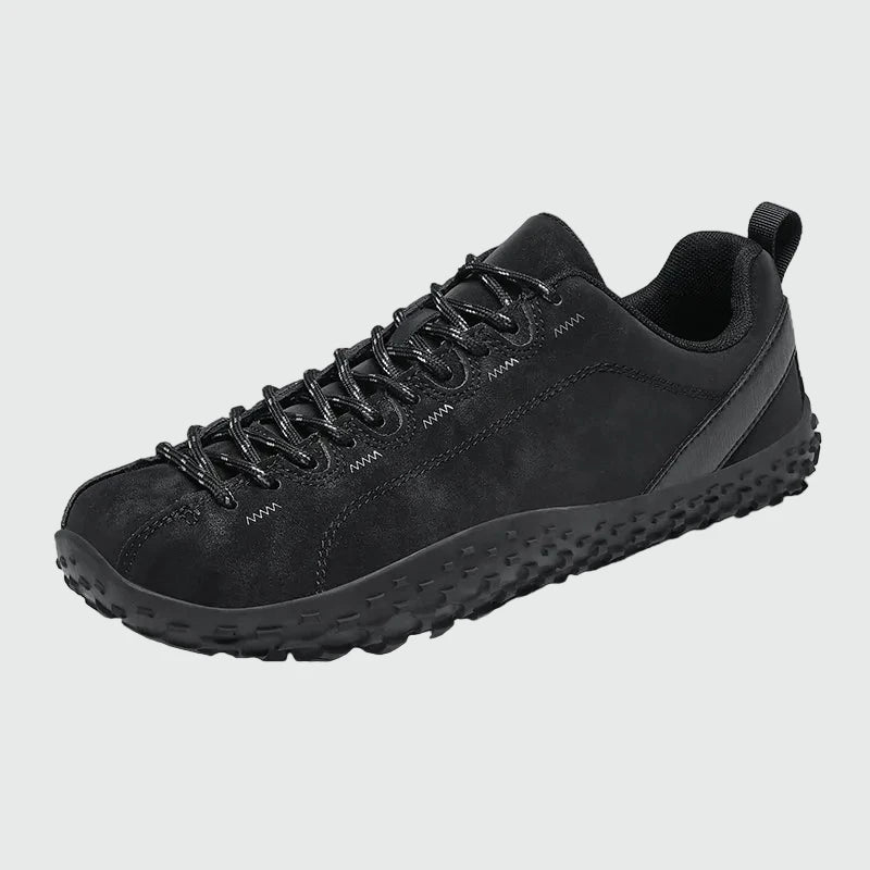 Dannto black barefoot outdoor sneakers shown from a three quarter view